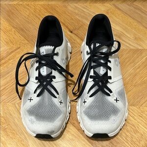 On Running Gray and Black Athletic Shoes